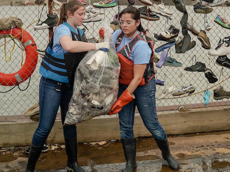 students volunteering on barge